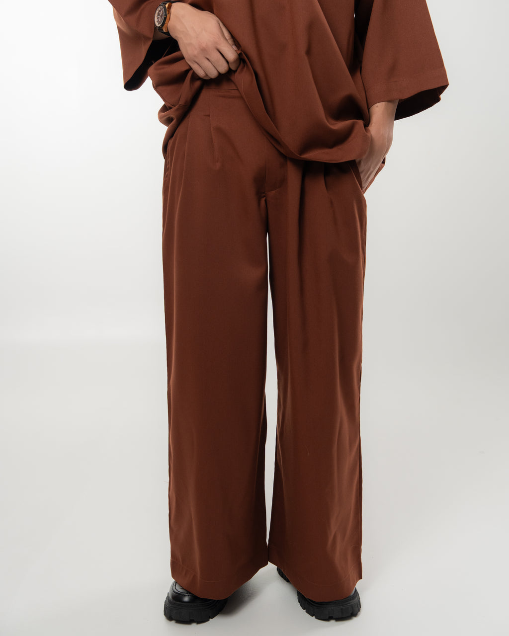 ARJUNA IN RICH BROWN
