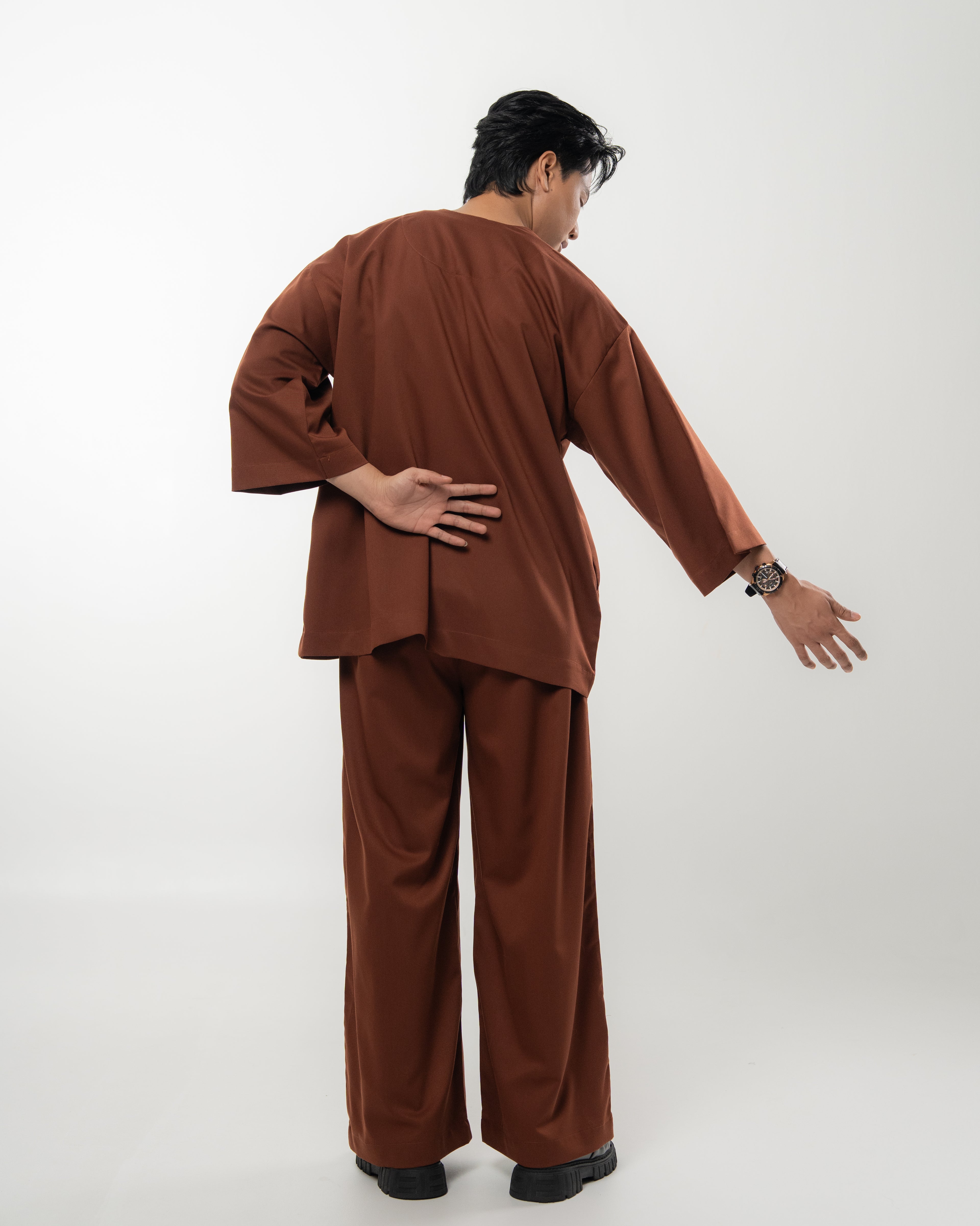 ARJUNA IN RICH BROWN