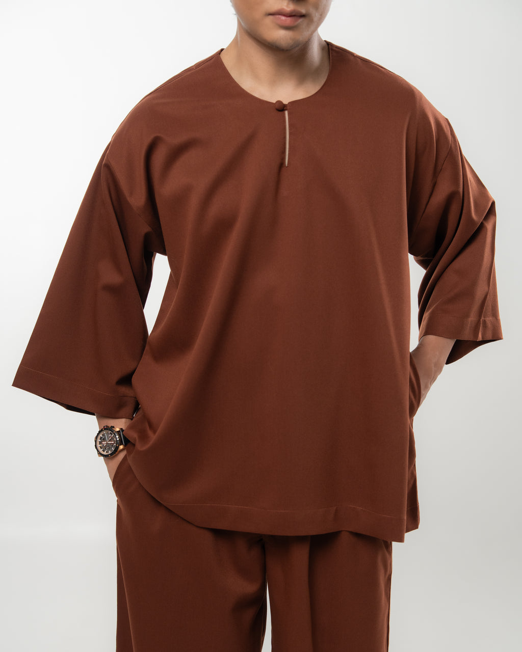 ARJUNA IN RICH BROWN