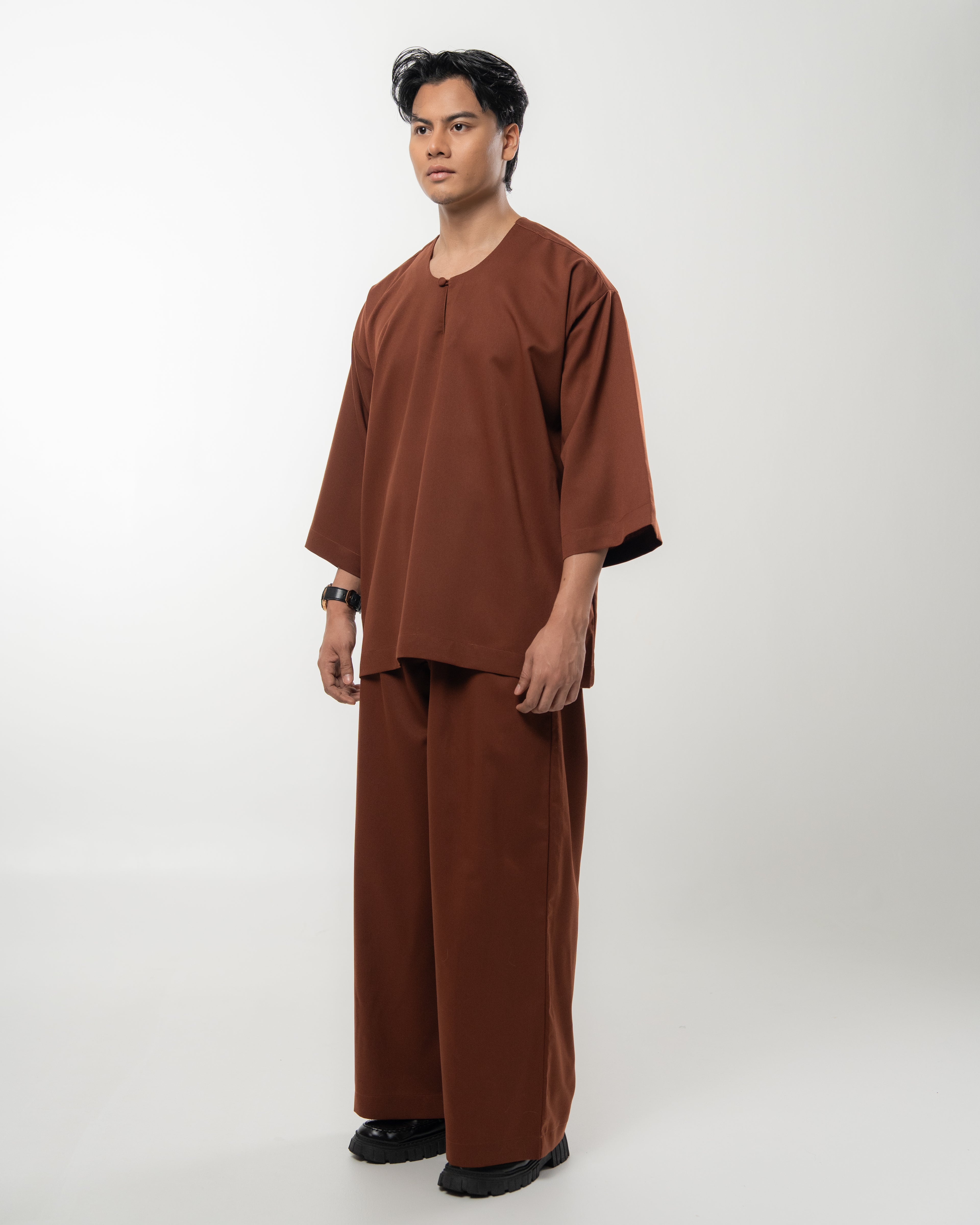 ARJUNA IN RICH BROWN