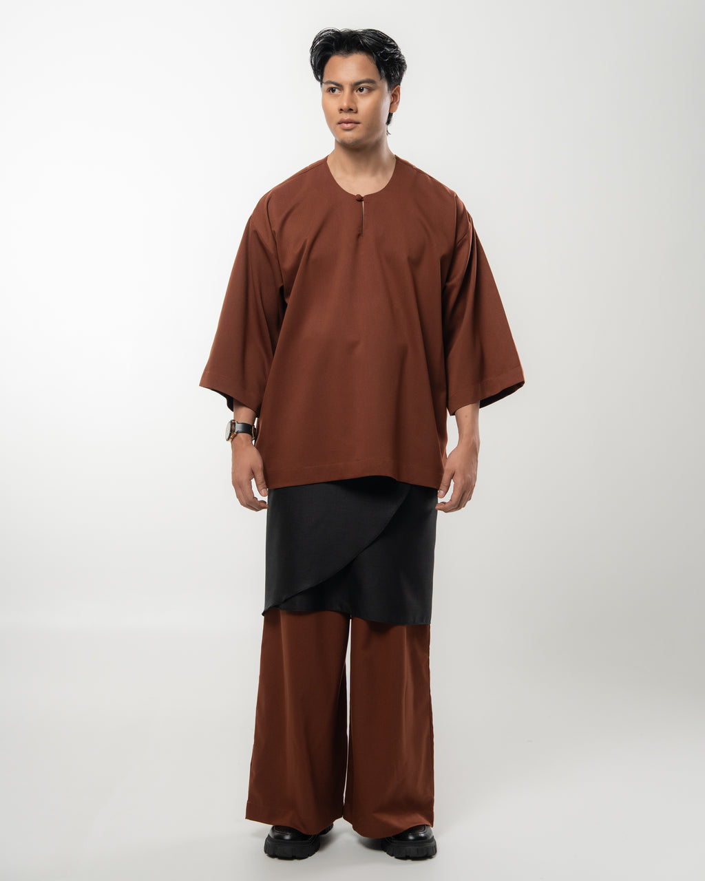 ARJUNA IN RICH BROWN