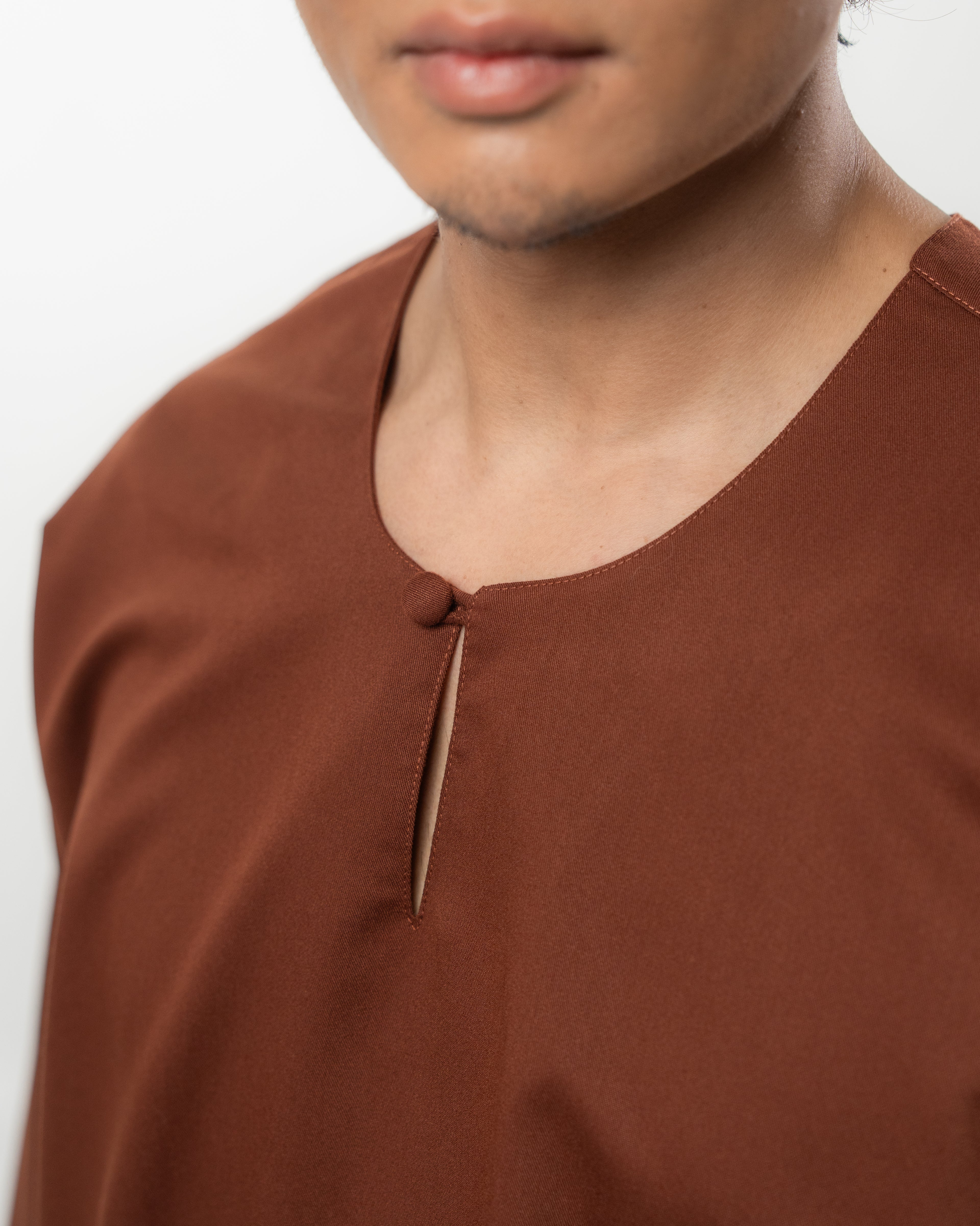 ARJUNA IN RICH BROWN