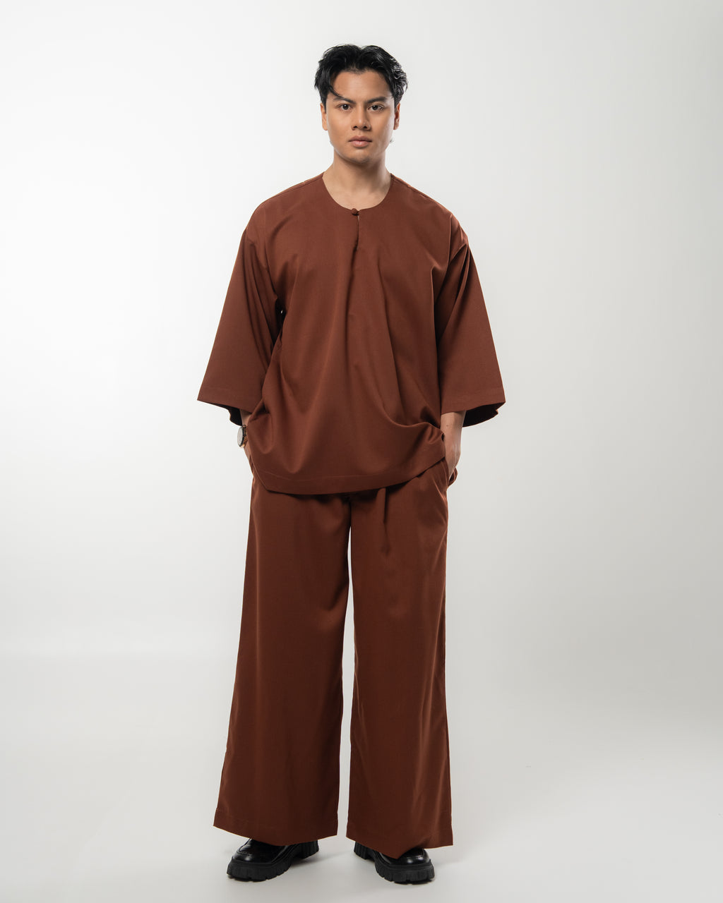 ARJUNA IN RICH BROWN